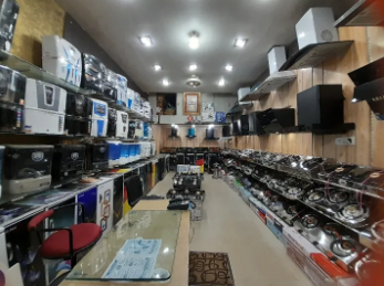 Retail sales counter at electronics store in Ratlam - family shopping